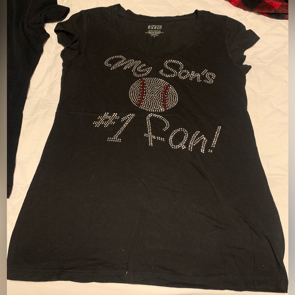 My sons #1 fan⚾️ size L runs small. Stretches great condition